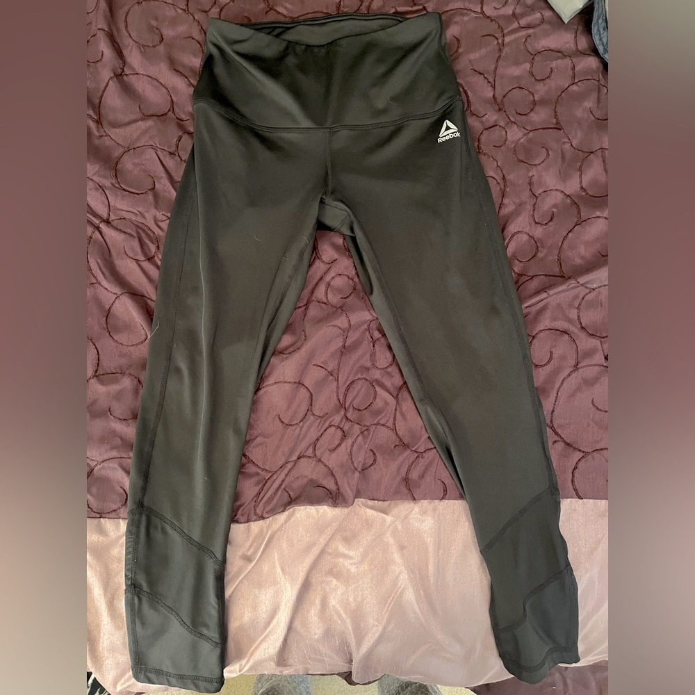 Reebok athletic leggings. Black. Medium wear, good condition. US size XS.